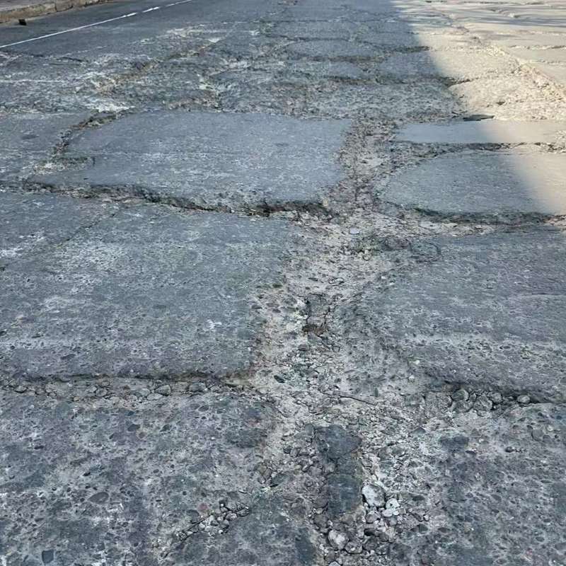 南川路面起砂露石子修补料
